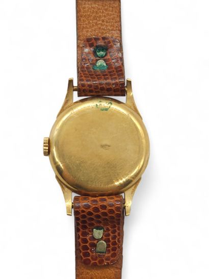 TISSOT
Brown leather wristwatch with gilt...
