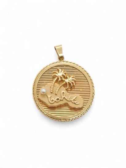 PENDENTIF circulaire en or jaune 750° représentant...