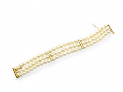 BRACELET with three strands of cultured pearls,...