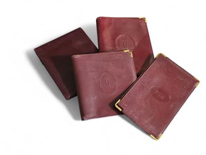 CARTIER France 
Ensemble de trois portefeuilles...