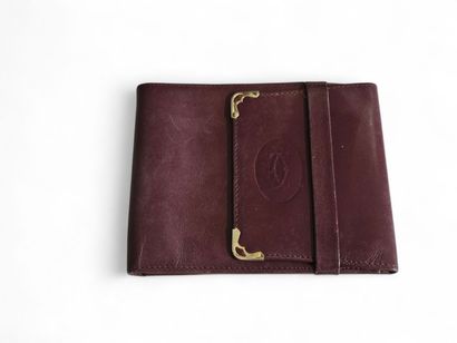 CARTIER France 
Ensemble de trois portefeuilles...
