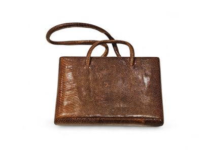 SAC minaudière en cuir marron découvrant...
