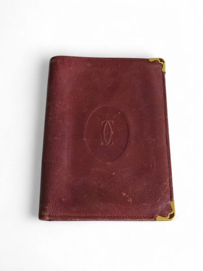CARTIER France 
Ensemble de trois portefeuilles...