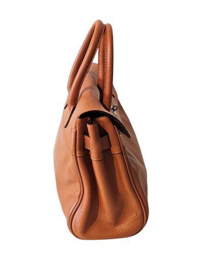 MAC DOUGLAS 
Sac à main en cuir orangé, fermeture...