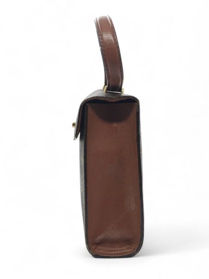 LOUIS VUITTON Malesherbes
Bag in monogram...