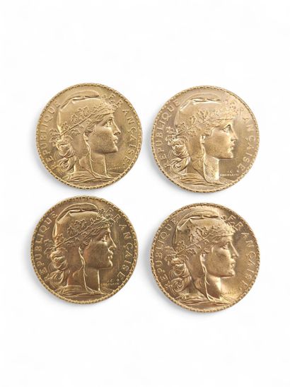 FOUR 20 franc gold coins with rooster
Year...