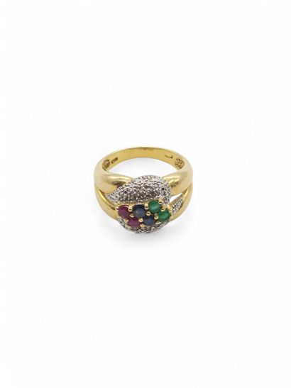 BAGUE en or jaune et gris 750° ornée de rubis,...