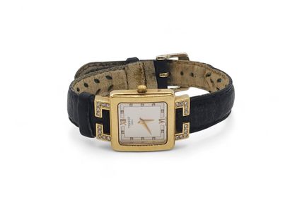 TISSOT 
Square-case wristwatch in 750° yellow...