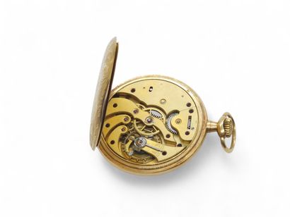 Pocket watch in 750° yellow gold, white enamelled...
