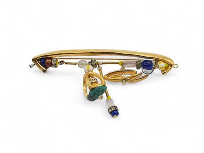 CHRISTIAN LACROIX
Gilded metal brooch and...