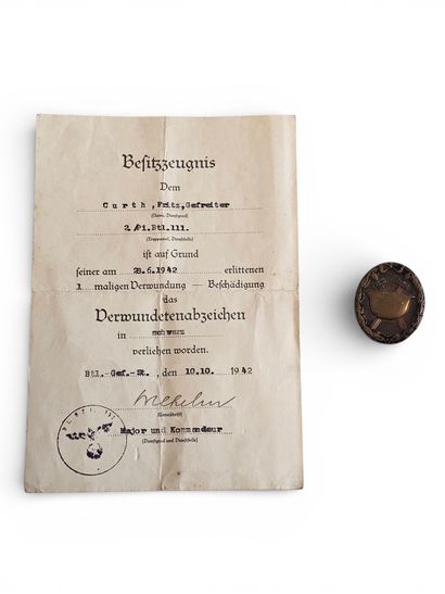 BADGE DES BLESSES ET DIPLÔME
Armée allemande...