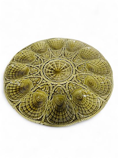 SARGUEMINES 
Green glazed earthenware oyster...