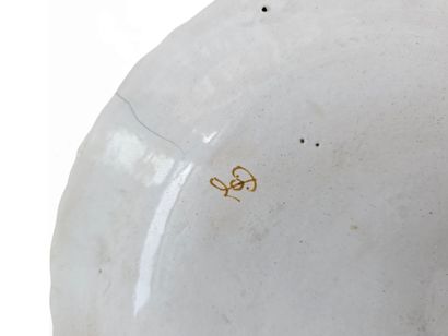 MOUSTIER
Round earthenware plate with yellow...