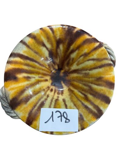 VALLAURIS
Plat en faïence venissée circulaire...