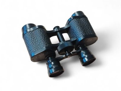 Pair of binoculars in case
As is