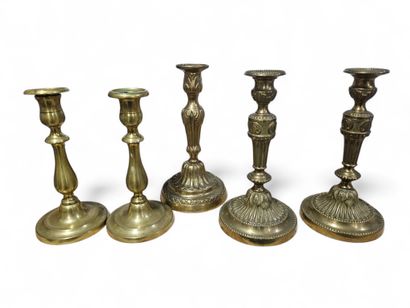 Set of bronze and brass candlesticks