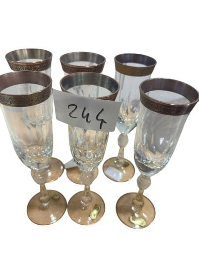 CHARLES FOGEL
Set of six cut crystal champagne...