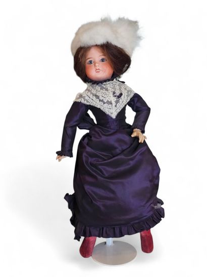 MON CHERI LP PARIS
Bisque head doll, fixed...