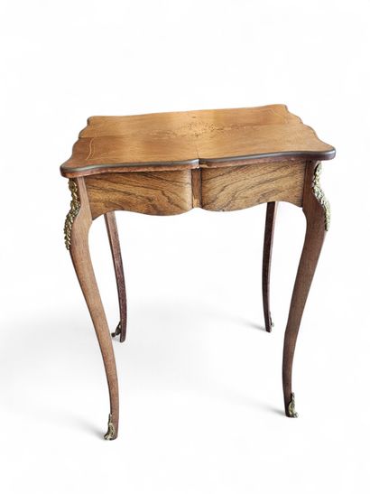 XXth century work in the Louis XV style
Veneered...