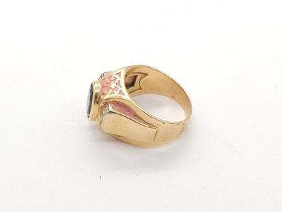 RING in yellow gold 750°, set with a garnet...
