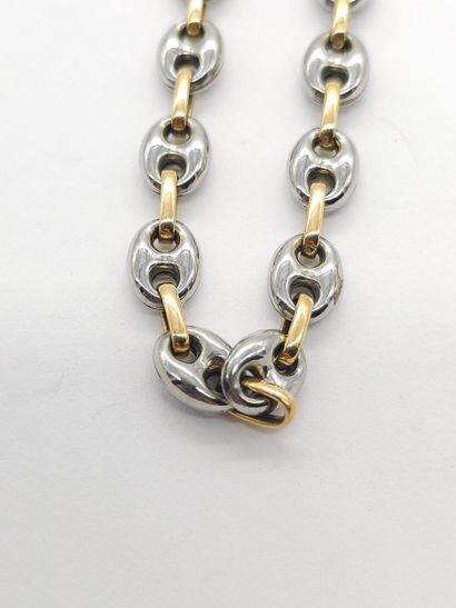 BRACELET in 750° gold and steel 
Gross weight:...