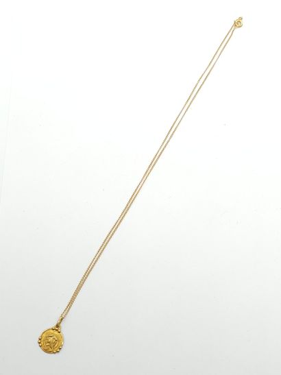 750° yellow gold CHAIN with medal 
Weight...