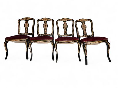 Four wooden chairs, seat in red fabric