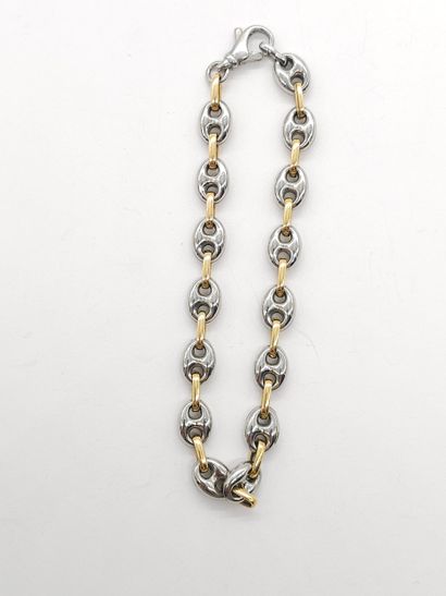 BRACELET in 750° gold and steel 
Gross weight:...
