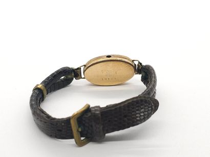 585° yellow gold wristwatch, oval case, cream...