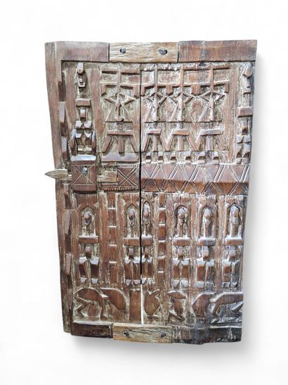 African work 
Small barn door in carved ...
