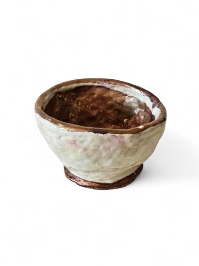 MP 
Cream and gold glazed ceramic pocket...