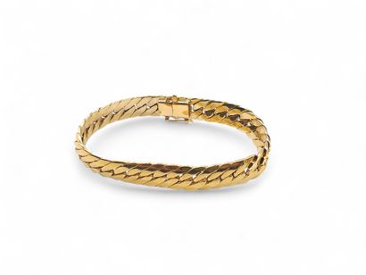 BRACELET in gold-plated metal with eight...