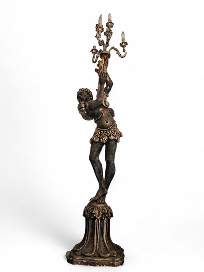Large six-light floor lamp depicting a young...
