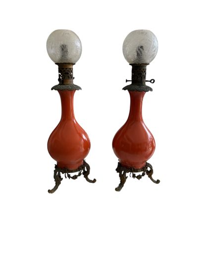 NAPOLEON III WORK
Pair of orange tripod earthenware...