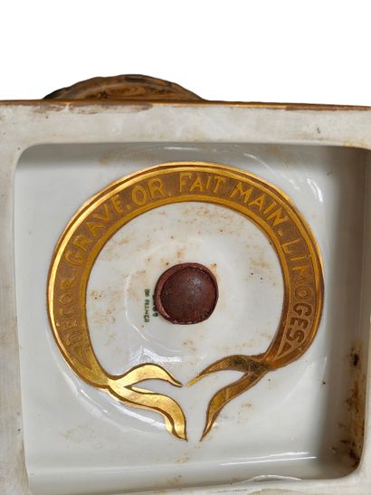 LIMOGES 
A white porcelain baluster vase...