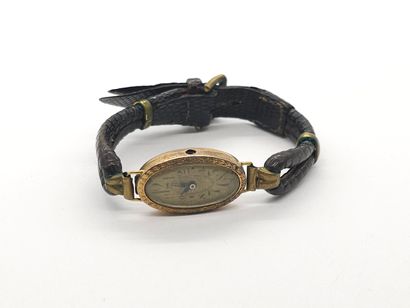 585° yellow gold wristwatch, oval case, cream...