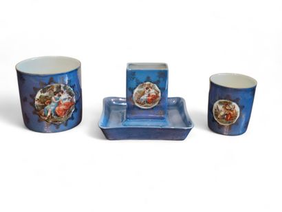 LIMOGES
Four-piece smoker's set in blue porcelain...