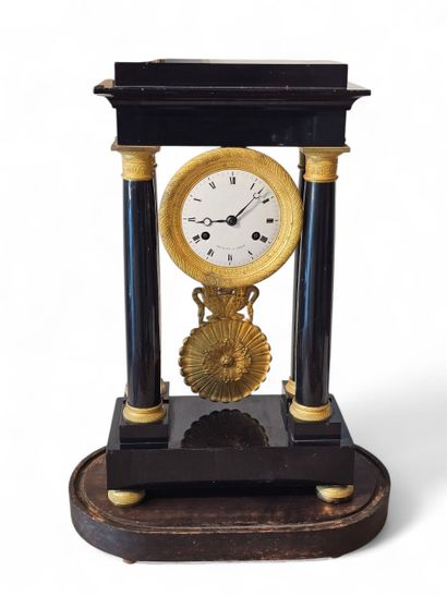 PORTICAL CLOCK in black marble with gilt...