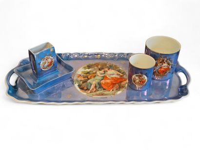 LIMOGES
Four-piece smoker's set in blue porcelain...