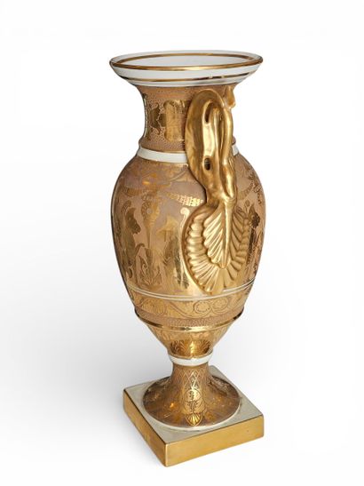 LIMOGES 
A white porcelain baluster vase...