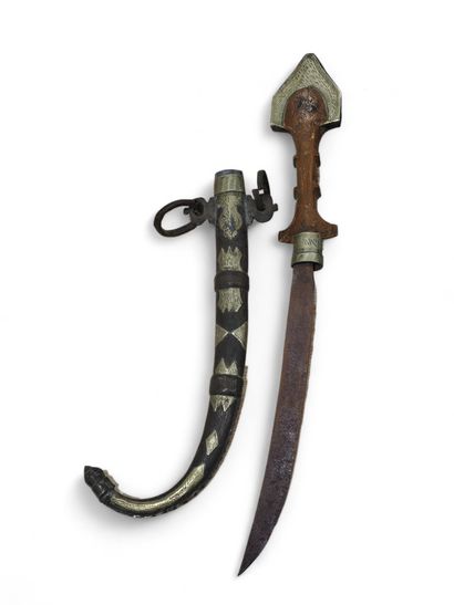 NORTH AFRICA WORK
Brass and wood ceremonial...