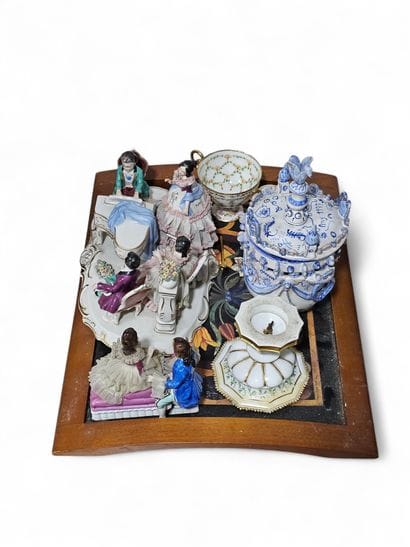 porcelain set including
Statues, covered...