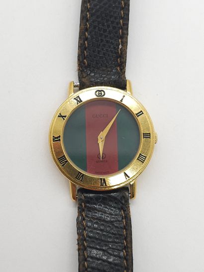 GUCCI 
Ladies' wristwatch, round metal case,...