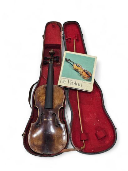 A violin in a box
As is
Included
A book on...