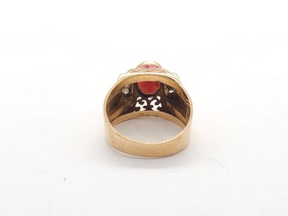 RING in yellow gold 750°, set with a garnet...