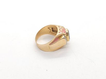 RING in yellow gold 750°, set with a garnet...
