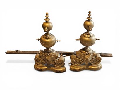 PAIR of ormolu andirons with scroll decor...