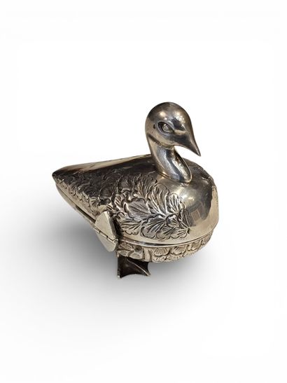 CAMBODIA, 20th century 
Chased silver duck-shaped...