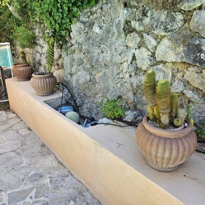 ENSEMBLE DE SIX POTS EN TERRE CUITE en forme...