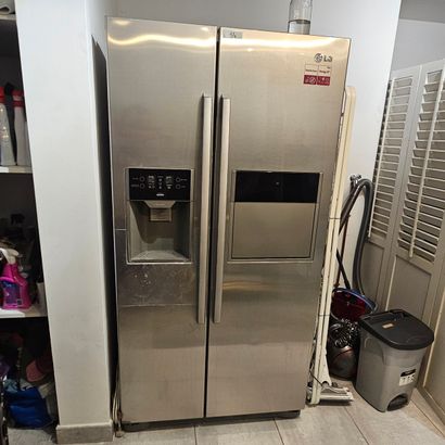 LG 
Refrigérateur americain ouvrant par deux...